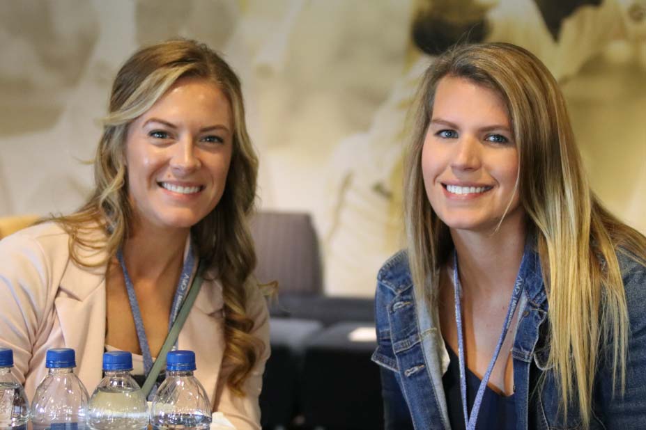 two-women-attendees-smiling